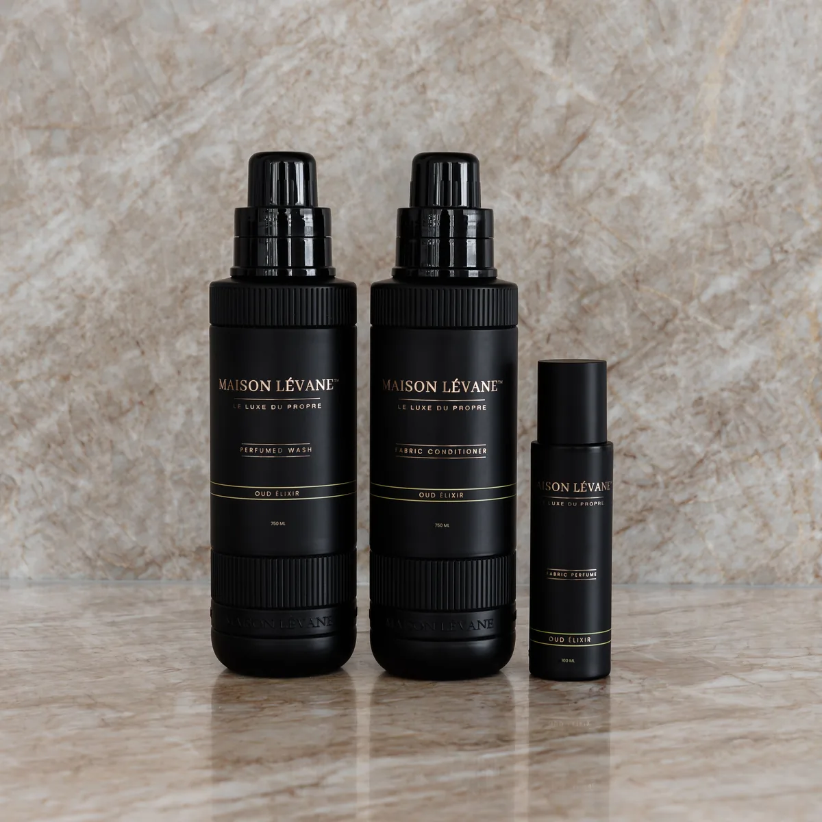 The Fabric Ritual in Oud Élixir: perfumed wash, fabric conditioner and fabric perfume spray